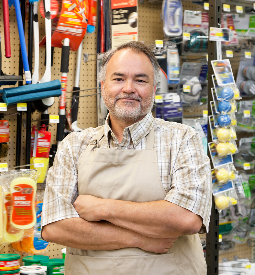 Shop Owner Smiling After Receiving Small Business Insurance in Greensburg, IN, Madison, IN, Seymour, IN