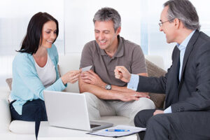 Couple and Small Business Insurance Agent Talking in Scottsburg, IN