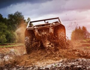 Side by Side in Mud with Side by Side Insurance in Columbus, IN
