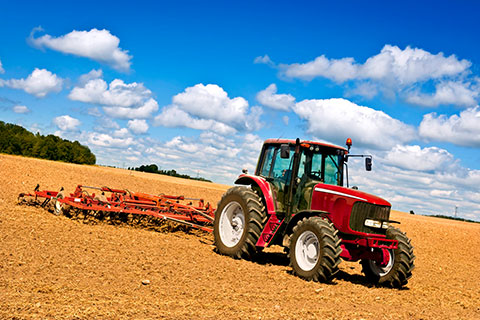 Tractor with Farm Insurance on a Columbus, IN farm 