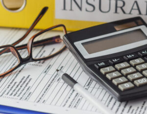 Calculator and Papers for Small Business Insurance in Seymour, IN