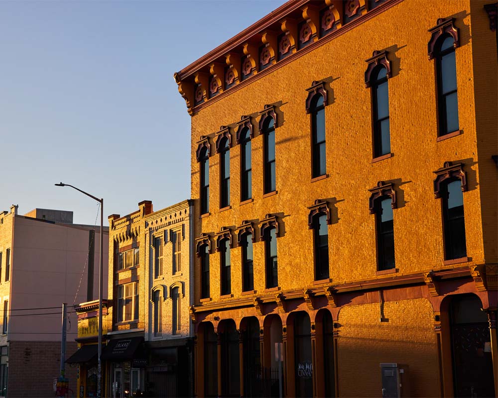 red building for a company with Business Insurance in North Vernon, Columbus, Madison, Seymour, Greensburg, and Versailles, IN, and the Surrounding Areas