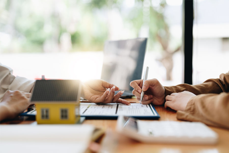 signing paperwork with Business Insurance in North Vernon, Columbus, Madison, Seymour, Greensburg, and Versailles, IN, and the Surrounding Areas