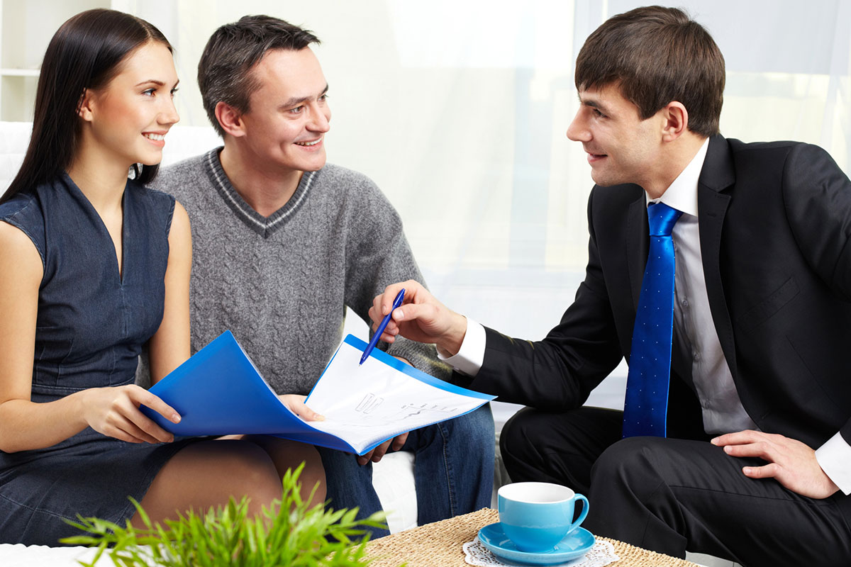 couple discussing Home Insurance in Columbus, IN, Madison, IN, North Vernon, Seymour, IN, and Surrounding Areas