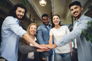 Happy group of employees in Seymour, IN with worker's comp insurance